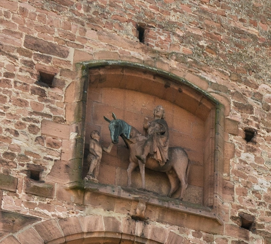 Das Plakat zeigt die Skulptur vom Martinstor: Der Heilige sitzt zu Pferde und zerschneidet seinen Mantel für den vor ihm stehenden Bettler. Das Plakat zeigt die Skulptur vom Martinstor: Der Heilige sitzt zu Pferde und zerschneidet seinen Mantel für den vor ihm stehenden Bettler.